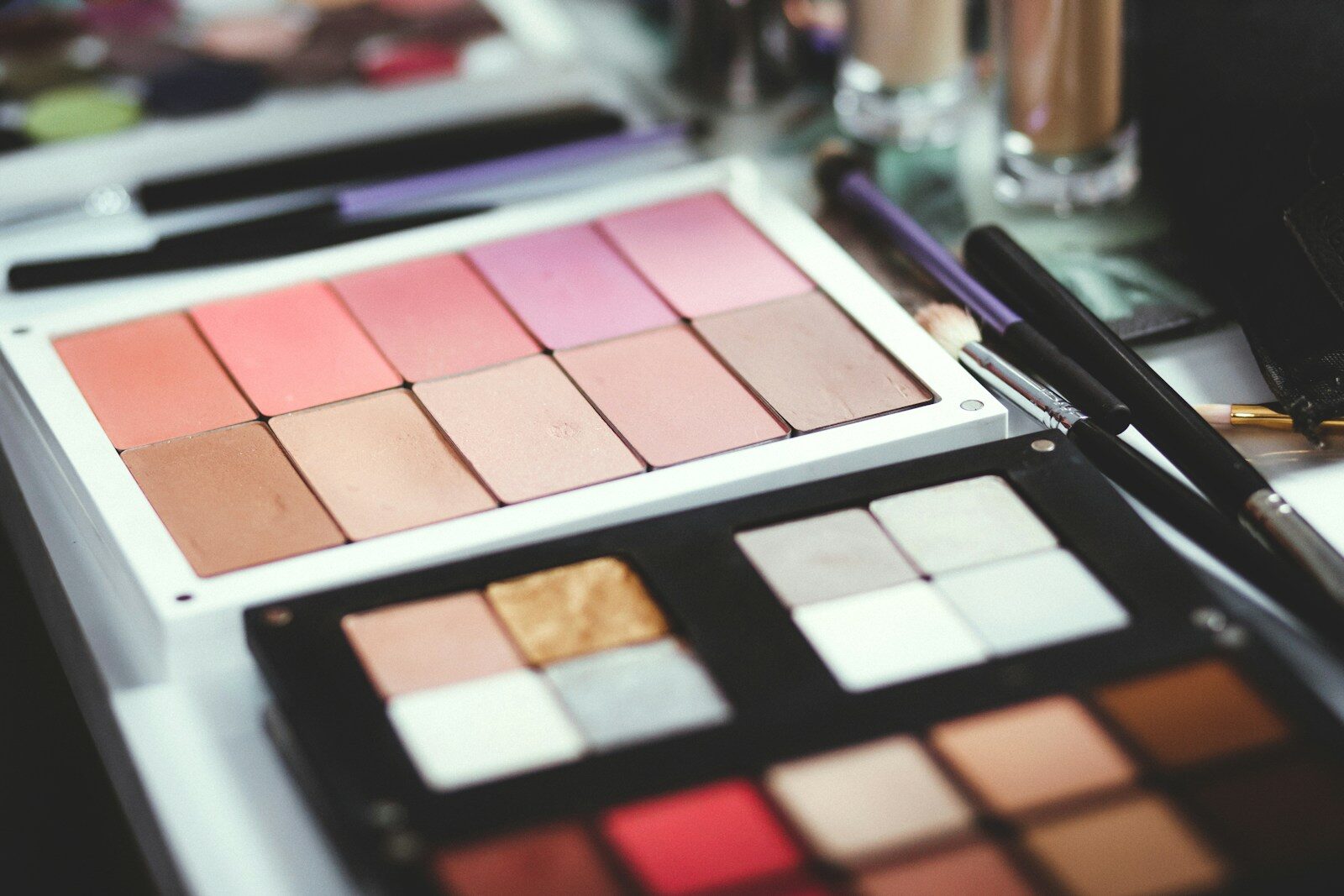 selective focus photography of makeup palette